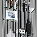 Modern Metal Frame Storage Shelving Unit With Glass Shelves And Decorative Items