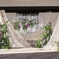 Elegant Wedding Backdrop With White Drapes Purple White Flowers Greenery And Crystal Decorations