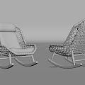 Two Comfortable Beige Rattan Rocking Lounge Chairs with Mesh Design