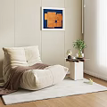 Beige Bean Bag Chair With Brown Blanket Side Table And Plant Decor On Light Rug