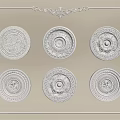 Six Intricate Carved Decorative Plates Arranged On Beige Background With Ornate Borders