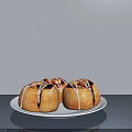 Fresh Baked Donuts With Chocolate Drizzle On White Plate Gray Tabletop