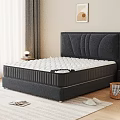 Comfortable White Mattress With Herringbone Pattern On Black Bed Frame And Upholstered Headboard