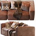 Brown Leather Two Seater Sofa With Patterned Pillows And Cozy Throws 3d model