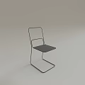 Modern Minimalist Single Chair with Sleek Metal Frame and Dark Seat Design
