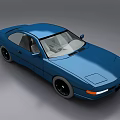 Blue Two Door Sports Car Featuring Sleek Design Black Wheels And Smooth Roof