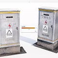 Industrial Electrical Distribution Boxes With High Voltage Warning Signs And Metal Enclosures On Concrete Bases