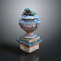 Succulent Plant Growing in Carved Decorative Planter with Pedestal Base and Ornate Details
