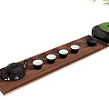 Tea Set with Black Teapot Four White Teacups on Wooden Tray and Green Plant