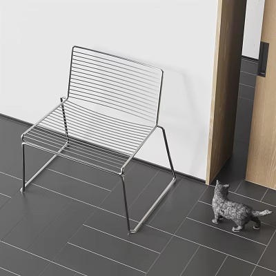 Modern Sleek Metal Leisure Chair Design With Dark Tile Floor White Wall Small Cat Nearby 3d model