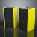 Pair of Yellow Standing Speakers With Modern Design And Black Front Panels