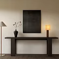 Long Wooden Console Table With Black Wall Art Table Lamp Floor Lamp And Vase With Branches