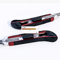 Black And Red Utility Knives With Ergonomic Handles And Stainless Steel Blades