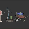 Outdoor Decorative Items With Red Birdhouse Blue Faucet And Wheelbarrow Filled With Flowers