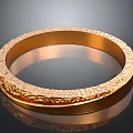 Golden Textured Bracelet With Shiny Surface And Intricate Carved Details