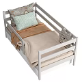 Kids Toddler Wooden Bed With White Guardrails Cartoon Pillow Brown Blanket And Striped Cushion