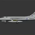 Silver Gray Military Fighter Jet With Wing Badges And Weapon Payloads On