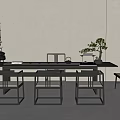 Modern Minimalist Tea Table and Chairs With Black Frame Tea Set and Potted Plant