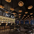 Modern Bar Interior With Vintage Pendant Lights Round Wooden Tables And Wine Racks