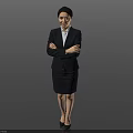 Professional Woman in Formal Business Suit Standing with Arms Crossed on Gray Background