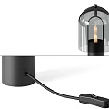 Modern Table Lamp With Black Base Transparent Glass Shade And Illuminated Bulb