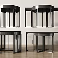 Modern Revolving Doors With Black Frames And Glass Panels On Wooden Flooring