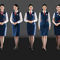 Women In Smart Blue Flight Attendant Uniforms Standing In A Row