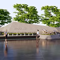 Feature Wall With Engraved Text Surrounded By Green Trees And Water Fountains With People Walking