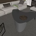 Modern Gray Irregular Coffee Table With Tray Glass Cups Vase And Green Plant In Living Room