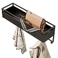 Stylish Beige Coats Hanging On Rack With Scarf And Paper Bag