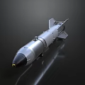Silver Missile Featuring Pointed Nose Tail Fins Streamlined Design on Black Background Reflective Surface