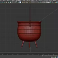 Traditional Black Cauldron With Handle And Tripod Legs Filled With Red Brown Spices