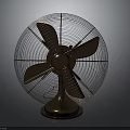Copper Colored Electric Fan With Metal Mesh Guard Blades And Stable Base