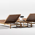 Two Rattan Woven Lounge Chairs With Wooden Frame And Side Table Lamp