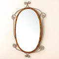 Decorative Ornament Set Featuring Oval Mirror With Wooden Frame And Metal Scrollwork
