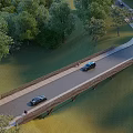 Scenic Wooden Landscape Bridge Surrounded by Green Trees and Lush Grass Under Clear Blue Sky