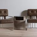 Brown Leather Leisure Seating Set With Metal Frame And Wooden Round Side Table
