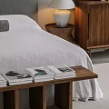Modern Hotel Room With King Bed Gray Headboard White Bedding Wall Art And Large Windows