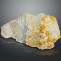 Natural Stone Material With Yellowish White Color And Irregular Shape On Dark Reflective Background