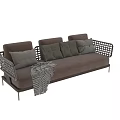 Modern Outdoor Sofa With Woven Armrests Metal Frame Brown Cushions And Throw Blanket
