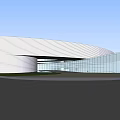 Modern Architecture Building With Curved Exterior And Glass Curtain Wall Design Under Blue Sky