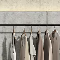 Metal Clothing Racks With Hanging Clothes And Dresses In Minimalist Store Interior