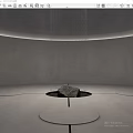 Concrete Circular Garden Ornament With Central Stone Water Flow And Overhead Lighting