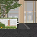 Modern Building Entrance Feature Wall With Stone Surface And Lush Green Plants