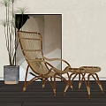 Rattan Leisure Chair With Matching Side Table And Potted Plant Near Wall Art