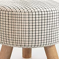 Round Ottoman Stool With Checkered Fabric Upholstery And Wooden Legs