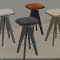 Modern Bar Stools With Various Colored Upholstered Seats And Wooden Legs