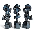 Abstract Stacked Sculptures With Textured Forms Gray Blue Brown Geometric Carvings