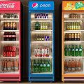 Colorful Beverage Display Coolers With Red Blue Orange Designs Stocked With Various Drinks And Bottles