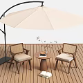 Outdoor Chairs With Small Round Table And Large Umbrella On Wooden Deck